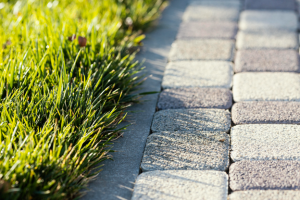 Stamped Concrete vs. Natural Stone Patios: Which Is Best for Your Outdoor Space?